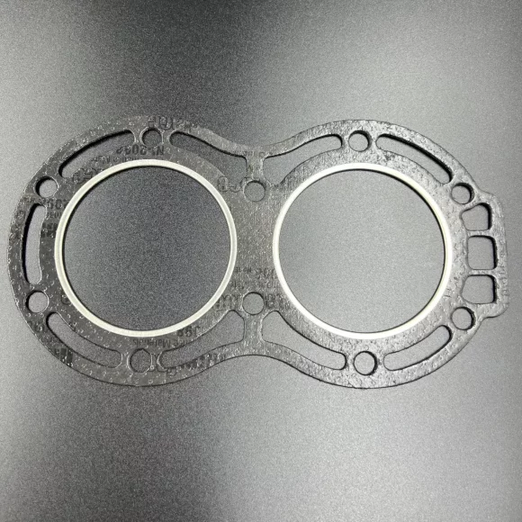 Прокладка под головку Suzuki DT20-30 (11141-96344) (Sinera) Прокладка под головку Suzuki DT20-30 (11141-96344) (Sinera)